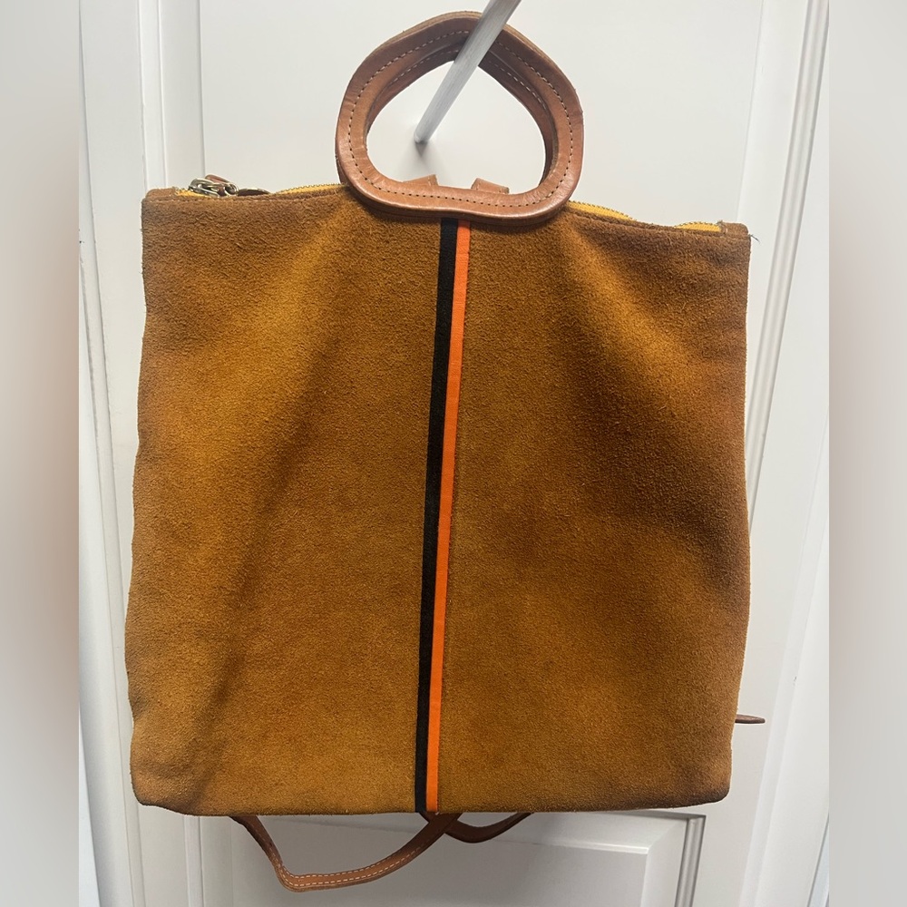 Clare V brown Suede backpack with Center Stripe in navy suede and red leather .